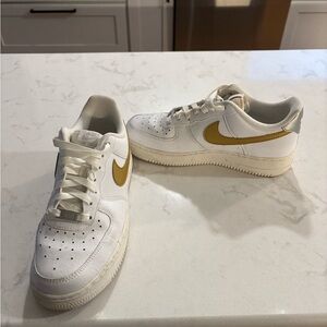 Nike White and Gold Athletic Shoes